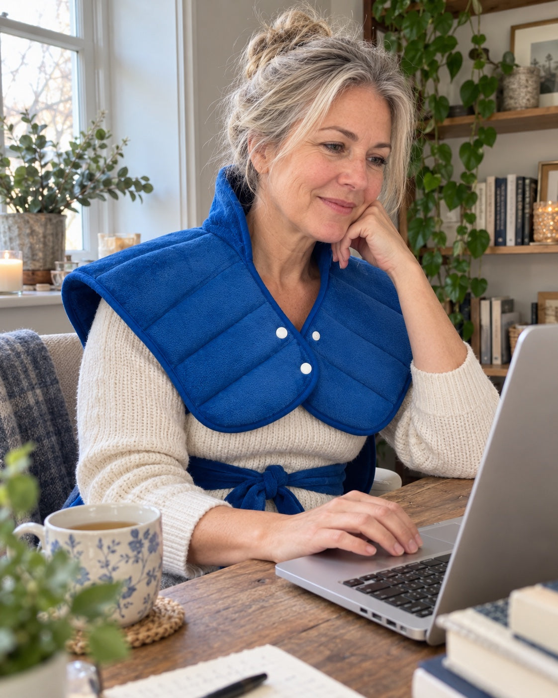 Weighted heated wrap at a home desk